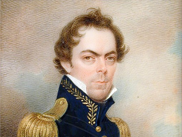 James Gadsden wearing 1800s blue and gold naval uniform.
