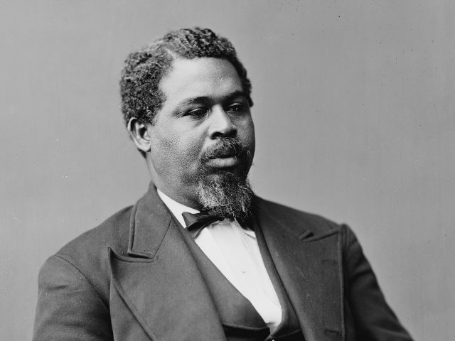 Robert Smalls wearing a dark suit and bow tie. 