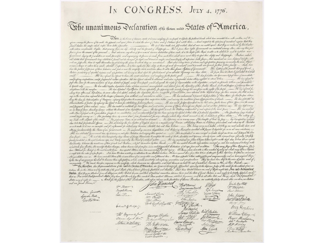 The Declaration of Independence on an off-white piece of paper. 