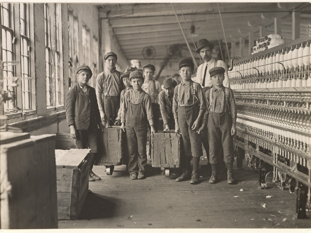 A group of children in a factory