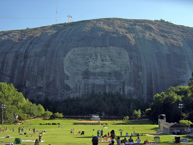 gray mountain with a picture etched into it