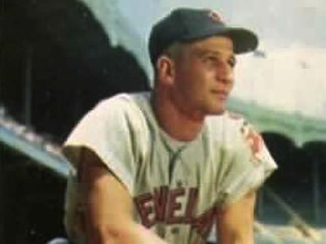 Al Rosen wearing a Cleveland Indians baseball uniform and dark baseball cap.
