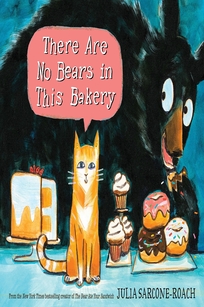 A black bear with a brown snout eating a pastry with sprinkles behind an orange and white cat. 
