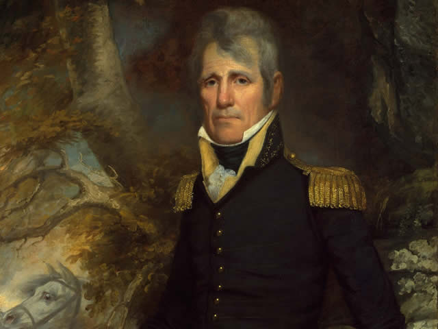 Andrew Jackson wearing a black and gold uniform with a paint of a white horse and trees in the background.