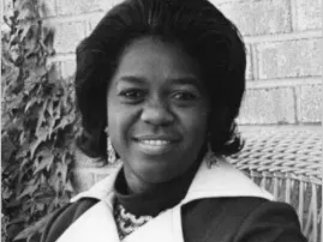 Black and white photograph of Juanita Willmon Goggins smiling