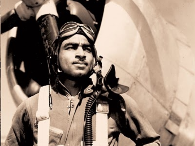 black and white photograph of Spann Watson dressed in aviation gear