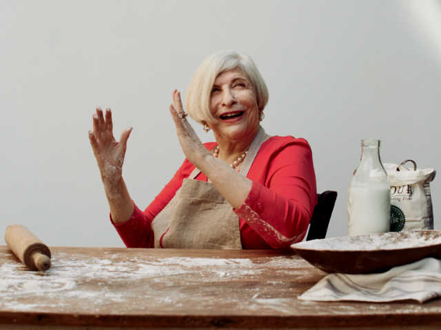 Color photograph of Nathalie Dupree making biscuits